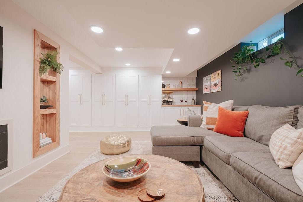 Vancouver basement living room with custom storage millwork