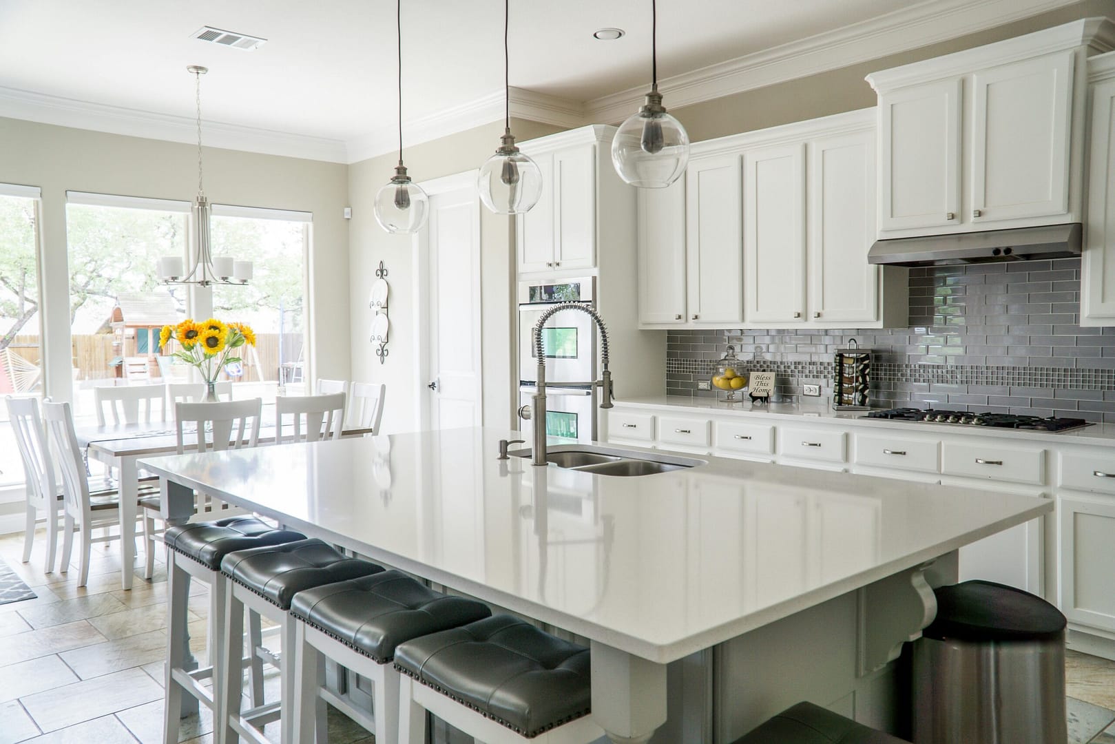 Modern Vancouver kitchen renovation showing white cabinets and quartz countertops