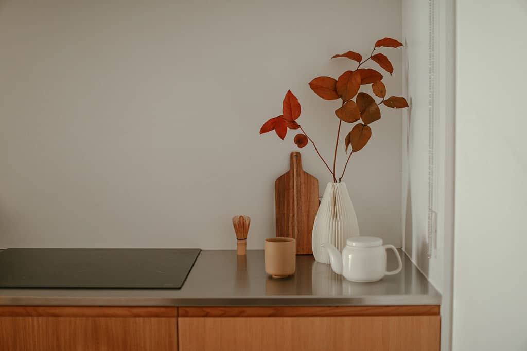 Vancouver Home Renovation featuring white vase with dry flower arrangement