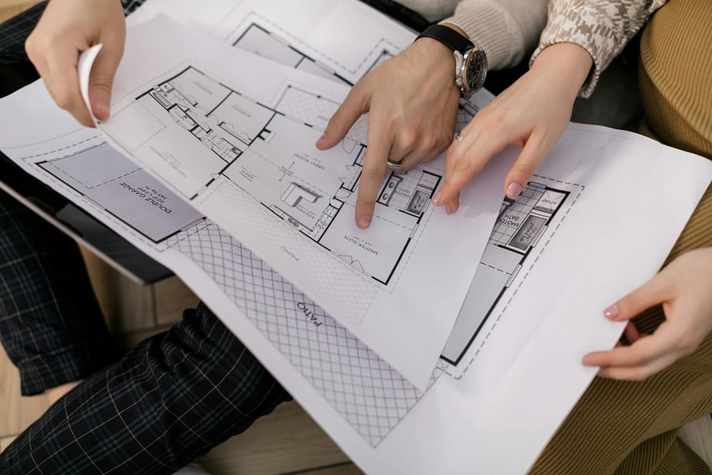 Construction permits and blueprints for Vancouver renovation project showing planning phase requirements