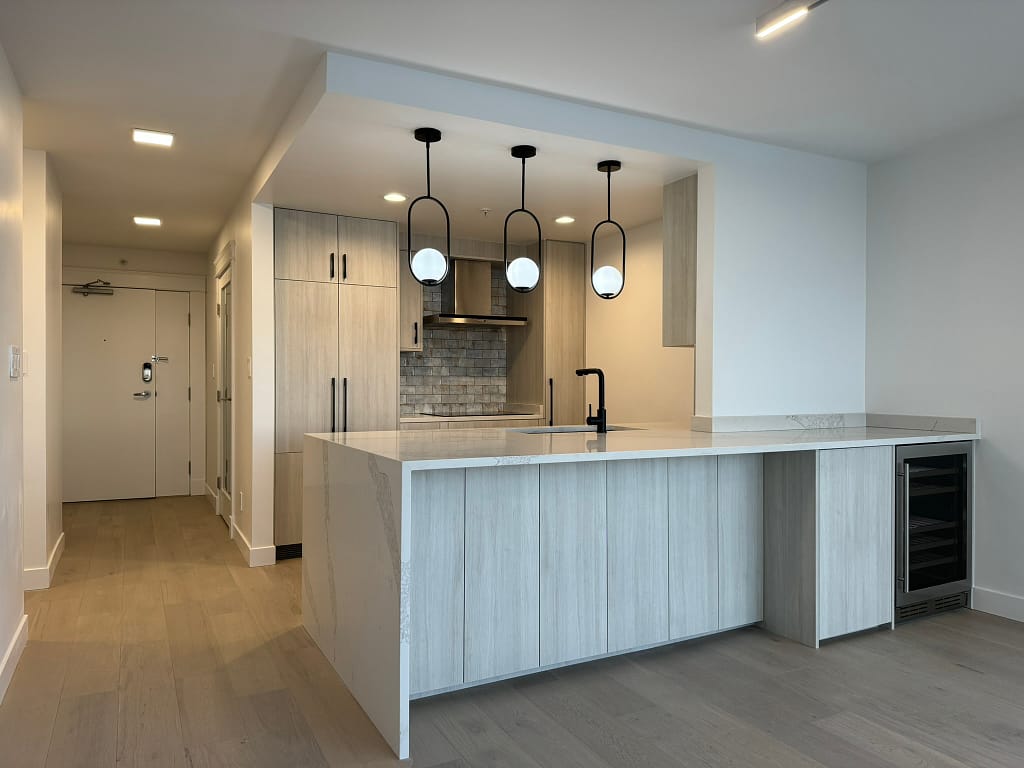 kitchen with oak cabinets and white quartz countertops