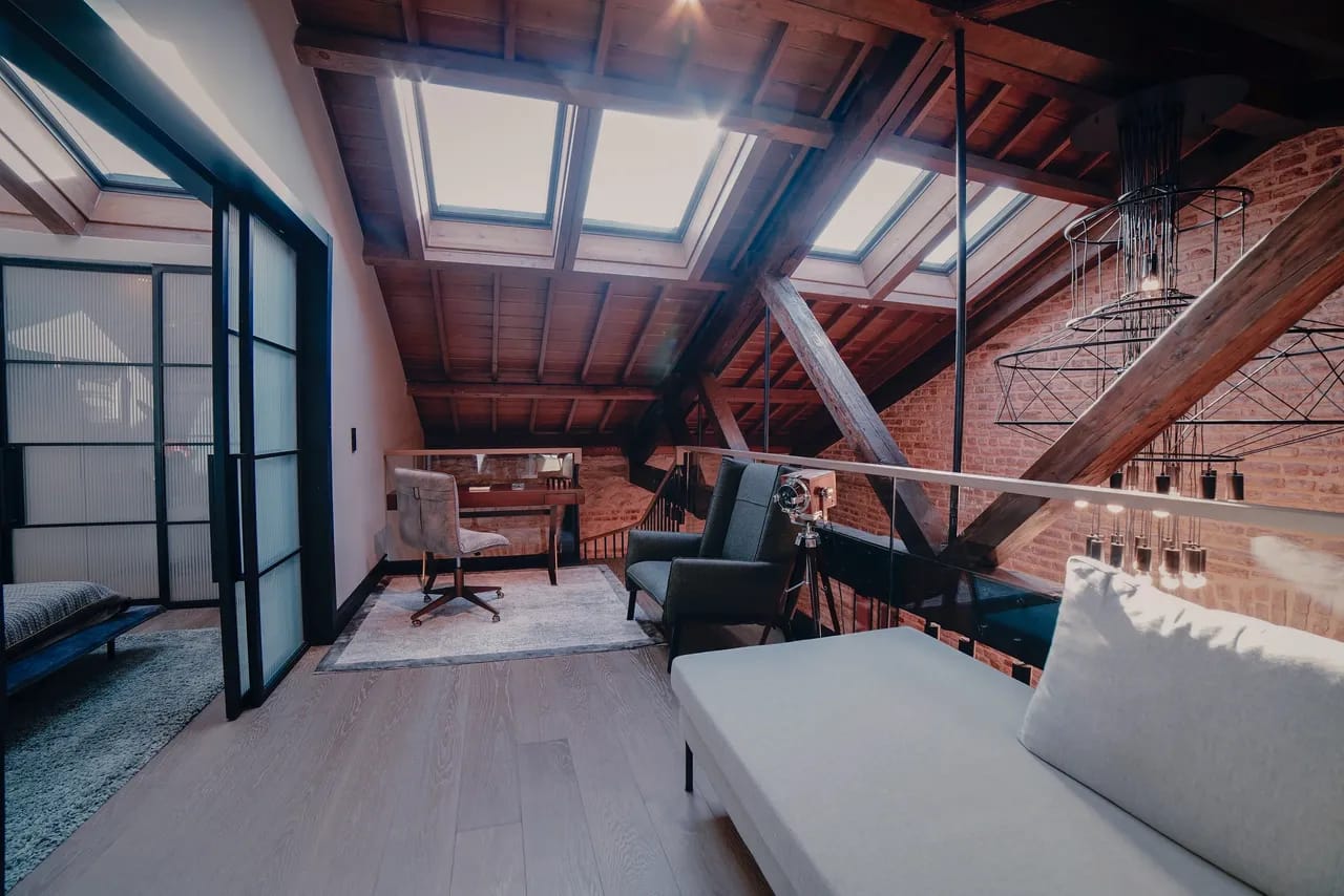 A very nicely designed loft area.