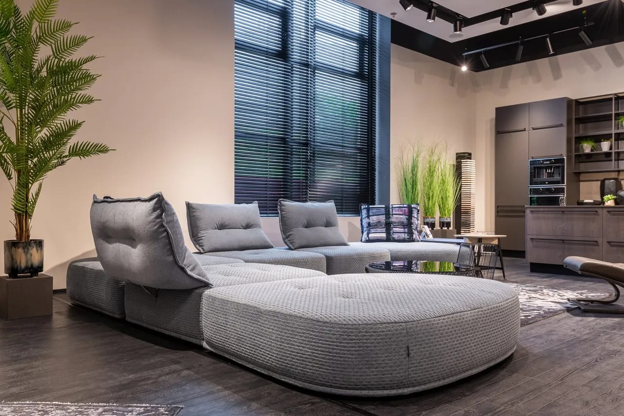 A modern apartment with high ceilings and high end cabinets