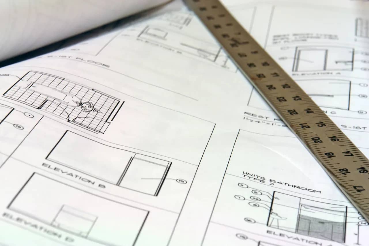 architectural drawings with a ruler