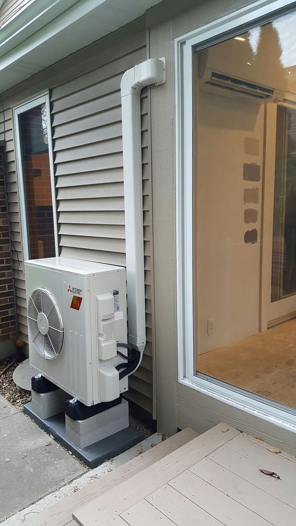 Modern heat pump installation in Vancouver home energy efficient renovation