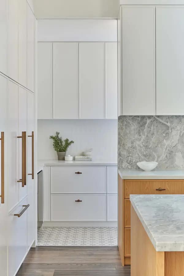 Custom wood cabinetry and modern kitchen detail in a West Vancouver home renovation