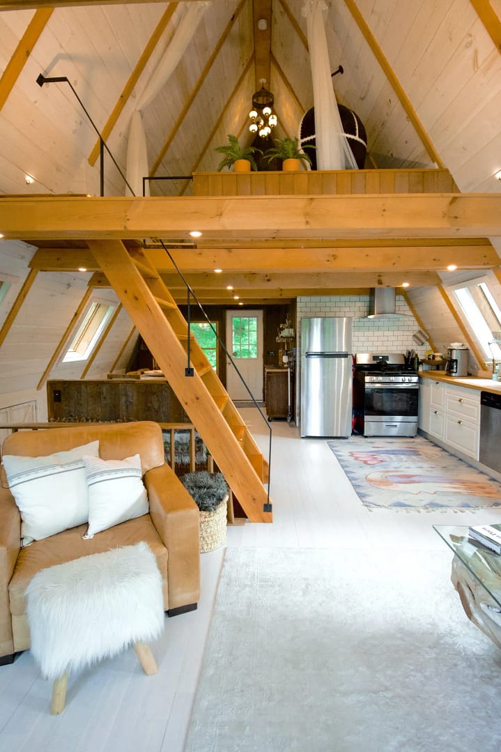 A very small home office on second floor of a loft unit.