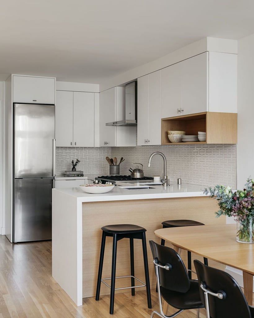 U-shaped kitchen design with abundant storage in Vancouver house