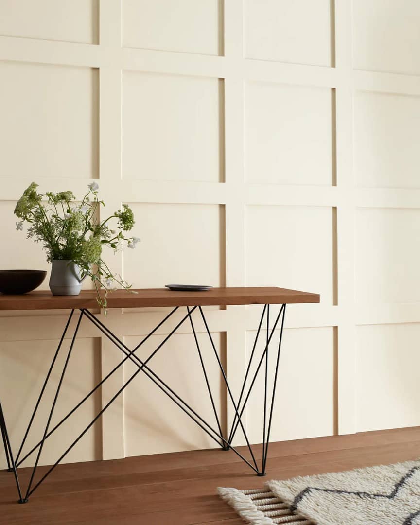 A wall painted in Benjamin Moore's Swiss Coffee color