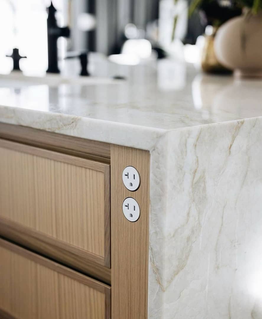 Modern Vancouver condo kitchen with smart appliances and quartz waterfall countertop renovation