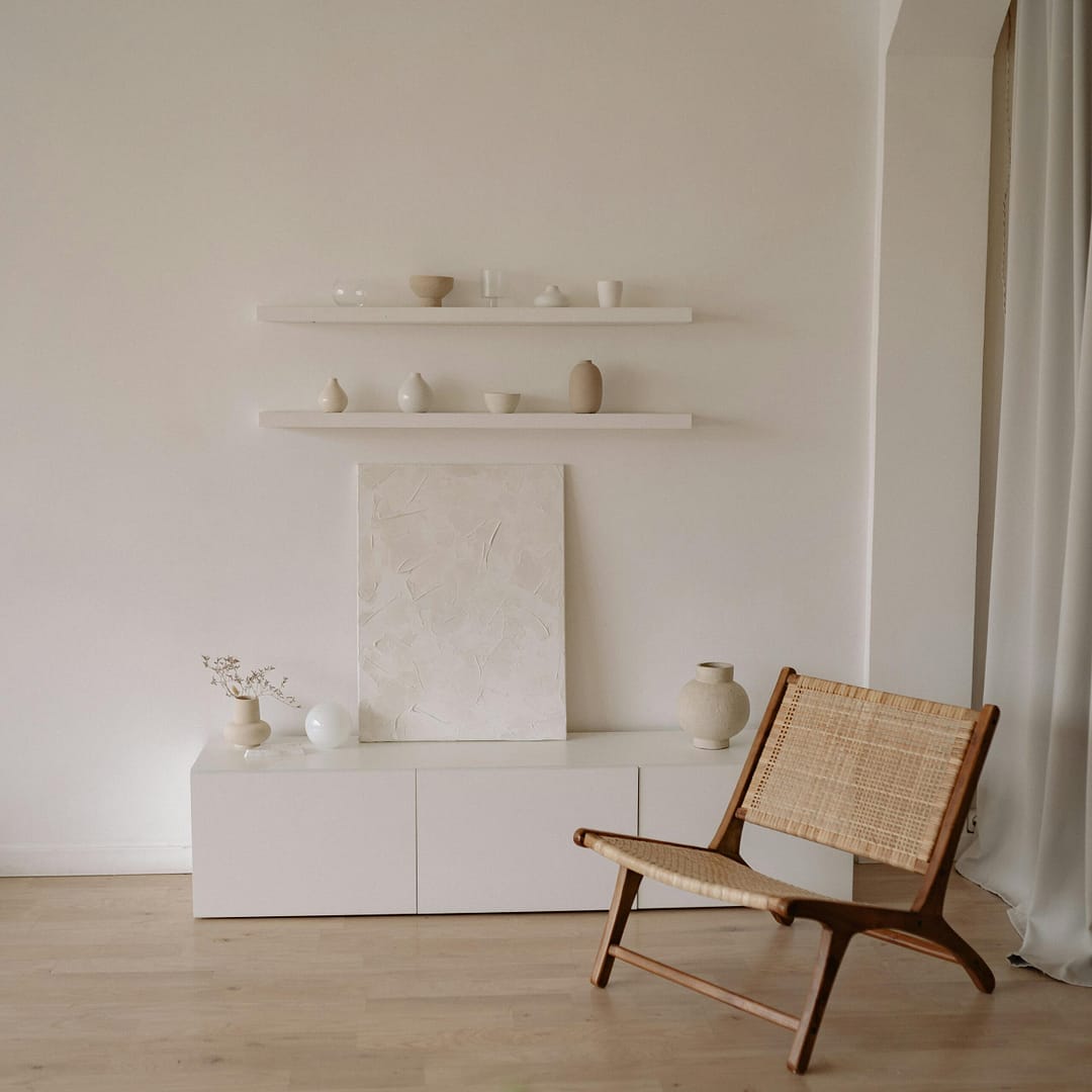 Flooring renovation with engineered hardwood floors and a wooden chair