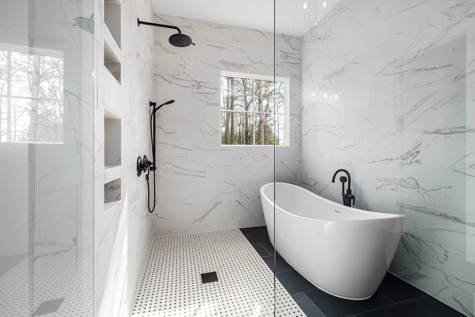 Bathroom Renovation Coquitlam featuring stand alone bathtub and black fixtures