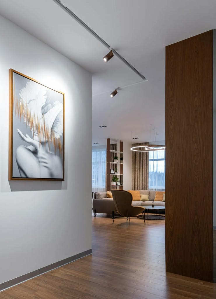 Condo Renovation Vancouver with large art work and engineered hardwood floors